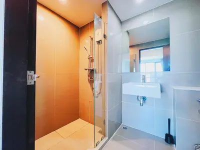 a bathroom with a shower and a sink at 38Nice room phuket town near Shopping Malls and Naka night market in Phuket Town