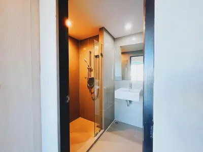 a bathroom with a shower and a sink at 38Nice room phuket town near Shopping Malls and Naka night market in Phuket Town