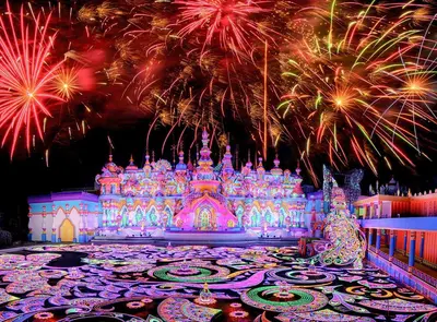 a lit up disney castle with fireworks in the background at Kamala beach house 100m to the beach in Kamala Beach