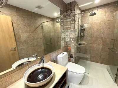 a bathroom with a sink and a toilet and a shower at Private apartment Title V Condo by Lofty in Rawai Beach