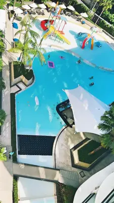 an overhead view of a swimming pool at a water park at Luxury studio near Nai Harn beach in Rawai Beach