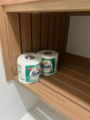 two rolls of toilet paper sitting on a shelf at Karon Butterfly Residence in Kata Beach