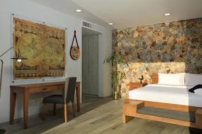 a bedroom with a bed and a desk with a desk at 4BDR Sugar Villa 2 in Kamala Beach