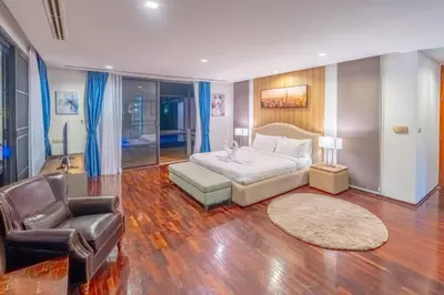 a bedroom with a bed and a couch and a chair at High End Imported Furniture Loch Palm Golf Course V145 in Kathu