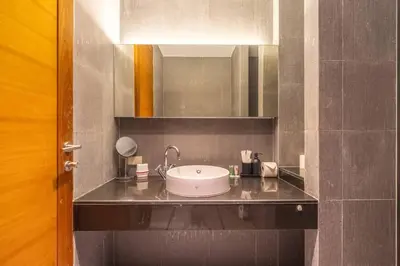 a bathroom with a sink and a mirror at High End Imported Furniture Loch Palm Golf Course V145 in Kathu