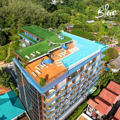 an overhead view of a hotel with a swimming pool at The Blue Mavi Hotel in Chalong