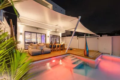 a house with a pool and a living room at VILLA Satori 4BR by Tropiclook in Rawai Beach