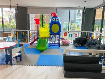 a nursery with a play room with a playground at Private apartments near Kata beach in Kata Beach