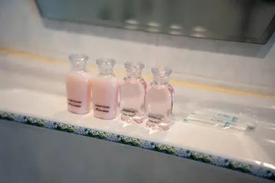 a group of three bottles of soap sitting on a sink at Coast Charm 6BR House Karon in Karon Beach