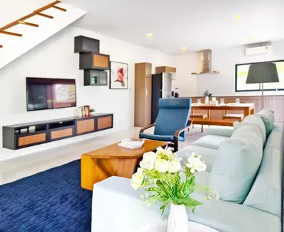 a living room with a couch and a table at Krabi Private Pool Villa 2 by Belcarra Spaces in Ban Khlong Haeng