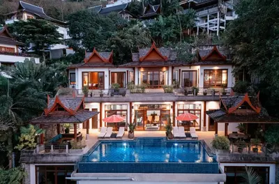 an aerial view of a house with a swimming pool at surin Luxurious 6br private swimming pool stunning sunset in Phuket Town