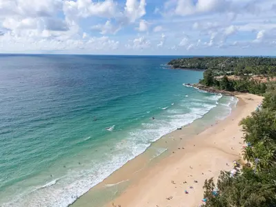 an aerial view of a beach and the ocean at surin Luxurious 6br private swimming pool stunning sunset in Phuket Town
