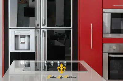 a kitchen with a glass counter with a stove at Golden Lily 4 Bedroom Private Pool Villa in Rawai Beach