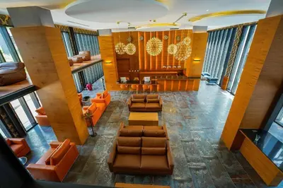 an overhead view of a lobby with couches and chairs at 600m to beach New City gate P214 #c60 in Kamala Beach