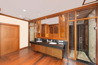 a bathroom with two sinks and a large mirror at Meraya Villa with Private Pool Near Nai Harn Beach in Rawai Beach