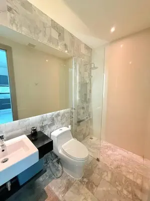 a bathroom with a toilet and a sink and a shower at Вилла 2 санузла, 2 спальни in Ban Suan