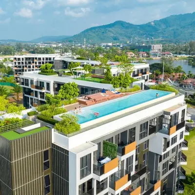 an aerial view of a building with a swimming pool at Skypark private new apartmant in Phuket