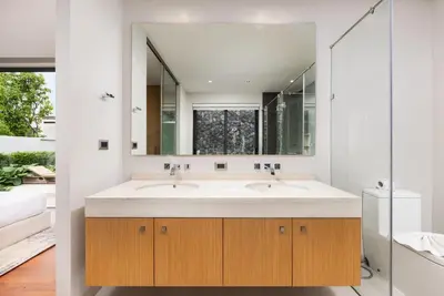 a bathroom with two sinks and a large mirror at Luxury 3BR Villa Eden with Private Pool in Bang Tao Beach