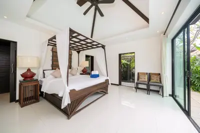 a bedroom with a hammock bed in a villa at Laguna luxury pool villa 3 bedroom in Phuket
