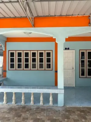 a building with a bench in front of it at P&I Group Home 4 Karon beach in Karon Beach