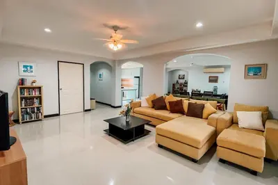 a large living room with a couch and a table at Rawai Palm Beach Квартира 220м in Rawai Beach