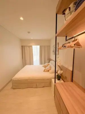 a bedroom with a bed and a large window at New apartment 2bedrooms in Laguna lakeside Bang Tao beach in Phuket