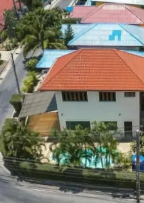 an overhead view of a house with an orange roof at Rawai pool villa in Rawai Beach