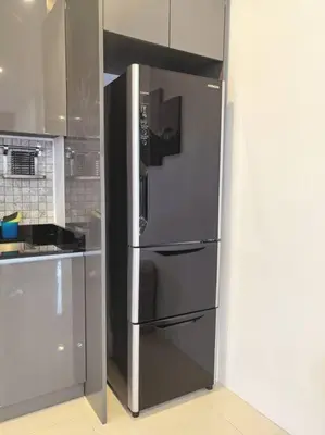 a stainless steel refrigerator in the corner of a kitchen at little princess \u5c0f\u516c\u4e3b\u522b\u5885 in Patong Beach