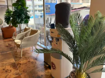 a potted plant sitting on top of a heater at Diva Boutique Hotel in Patong Beach