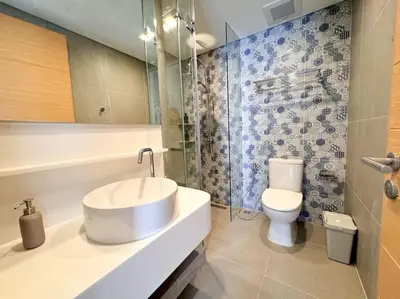 a bathroom with a sink and a toilet at 2bedrooms Cassia Residence lake view in Phuket