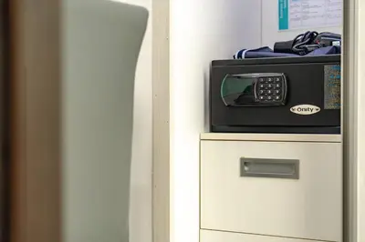 a microwave sitting on top of a cabinet at Minuets 2 Patong Beach Twin Sand Resort & Spa! C152 in Patong Beach