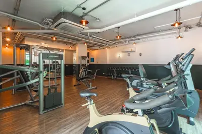 a gym with treadmills and elliptical machines at Minuets 2 Patong Beach Twin Sand Resort & Spa! C152 in Patong Beach