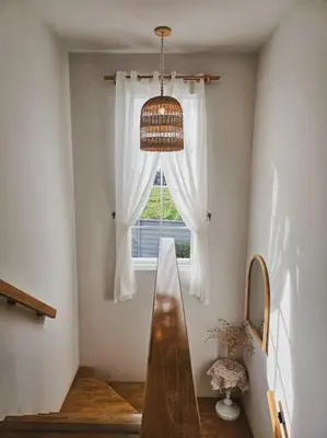 a room with a window and a wooden table at Little Cottage - 3BR House for family vacation By Little Latte House in Ban Pa Khlok