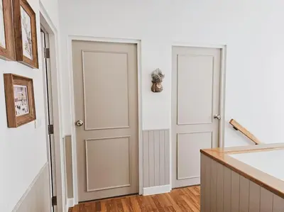 a hallway with two doors in a room at Little Cottage - 3BR House for family vacation By Little Latte House in Ban Pa Khlok