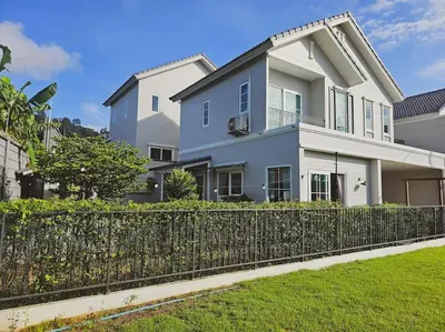 a white house with a fence in front of it at Little Cottage - 3BR House for family vacation By Little Latte House in Ban Pa Khlok