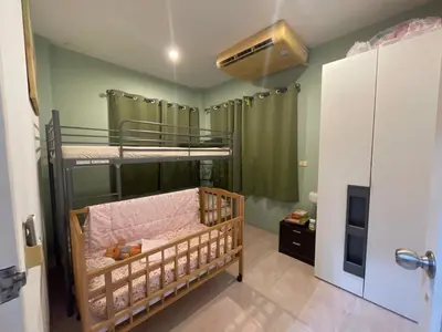 a room with two bunk beds and a fan at 3 bedrooms Semi-Detached with Pool near Kamala Beach in Kamala Beach