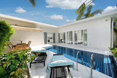 a swimming pool in the backyard of a villa at Brand New Villa in Ravai for a wonderful holiday 3 - bedroom in Ban Saiyuan (1)