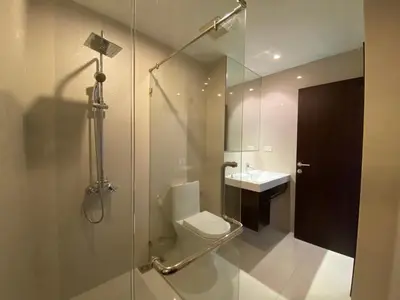 a bathroom with a shower and a toilet and a sink at Pond View apartment Title Rawai by Clavis in Rawai Beach