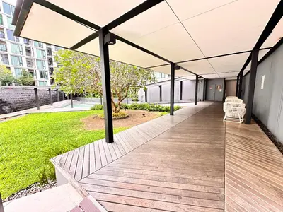 a large outdoor deck with a view of a park at the base updown\u4e00\u5367 in Phuket Town