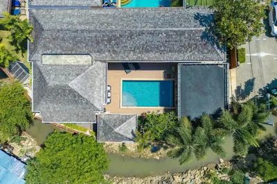 an aerial view of a house with a swimming pool at 3 Bedrooms villa walking distance to Rawai beach in Rawai Beach
