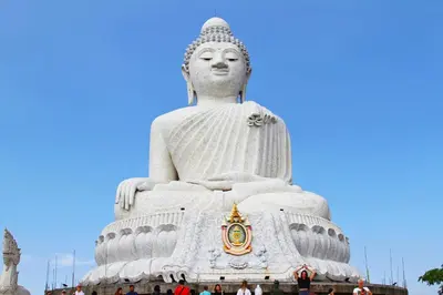a large statue of avalokitesvara in a park at Tongtong Garden Holiday Hotel\u666e\u5409\u5c9b\u901a\u901a\u82b1\u56ed\u9152\u5e97 in Rawai Beach