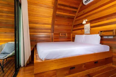 a bed in a sauna with wooden walls at Tropical Chalet-Style 2BR Villa with Pool Pasak Paradise 2, Bangtao in Bang Tao Beach