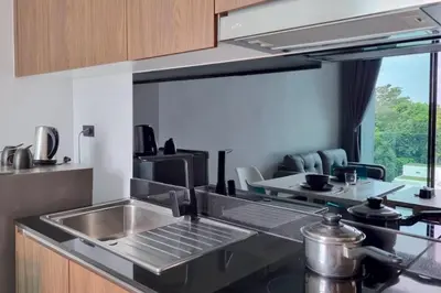 a kitchen with a sink and a counter top at Perfect Holiday Spot - Pool View Duplex in Tropical Naiharn! UTL A310 in Rawai Beach