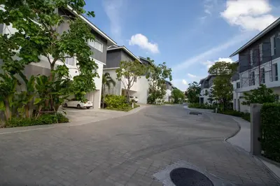 an empty street in an apartment complex at Beachfront 3BR Penthouse with Private Rooftop Pool - Laguna, BangTao in Phuket Town