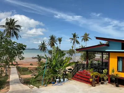 a house with a view of the beach at Baan Suan Sunset in Ban Laem Sai