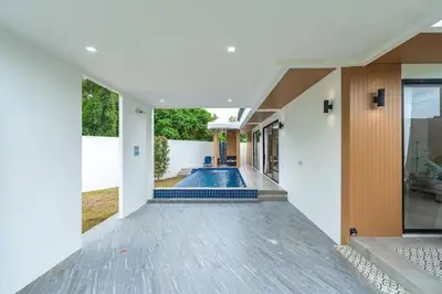 a house with a swimming pool inside of it at V149 La bella villa Brand New Fully Luxury in Bang Tao Beach