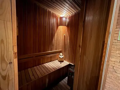 a wooden sauna with a wooden flooring and a wooden at Diamond Resort Phuket Condo Bang Tao Beach in Thalang