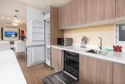a kitchen with a sink and a counter at The Sense Villa Phuket in Rawai Beach