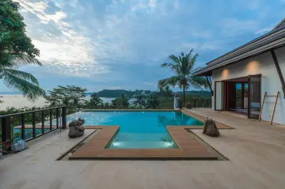 a swimming pool on the deck of a house at V151 Nicest Villa With The Best Views In Phuket in Thalang
