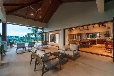 an open living room with a dining room and kitchen at V151 Nicest Villa With The Best Views In Phuket in Thalang